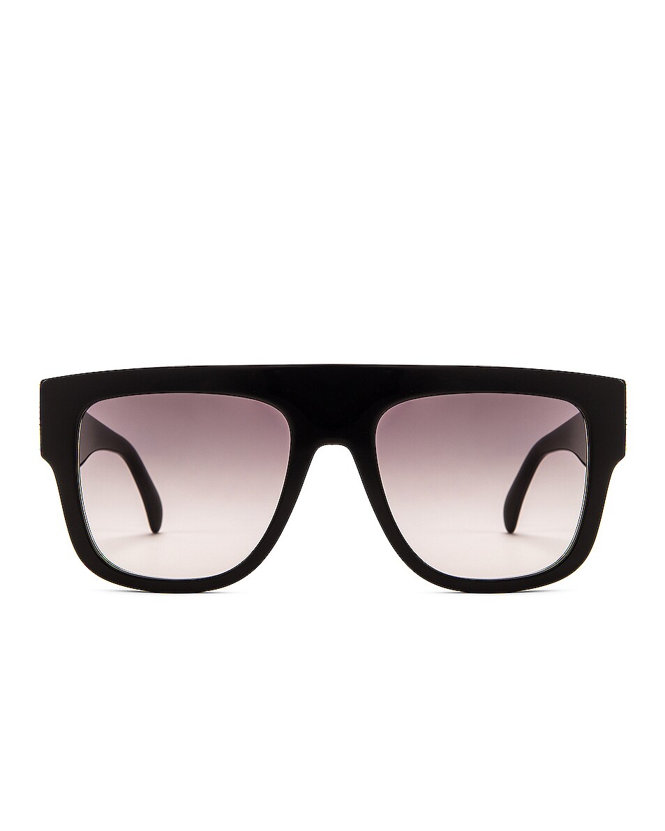 Image 1 of ALAÏA Flat Top Stud Sunglasses in Black & Silver