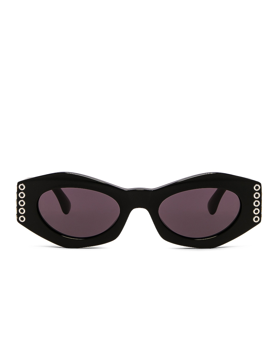 Image 1 of ALAÏA Oeillet Uregular Shape Sunglasses in Black
