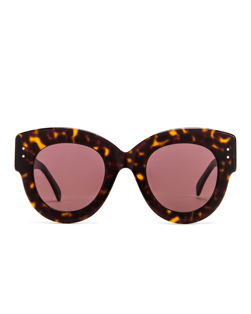 Image 1 of ALAÏA Round Cat Eye Sunglasses in Havana & Brown