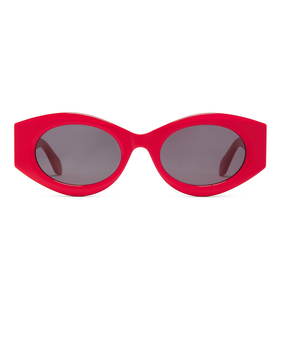 Image 1 of ALAÏA Oval Sunglasses in Red & Grey