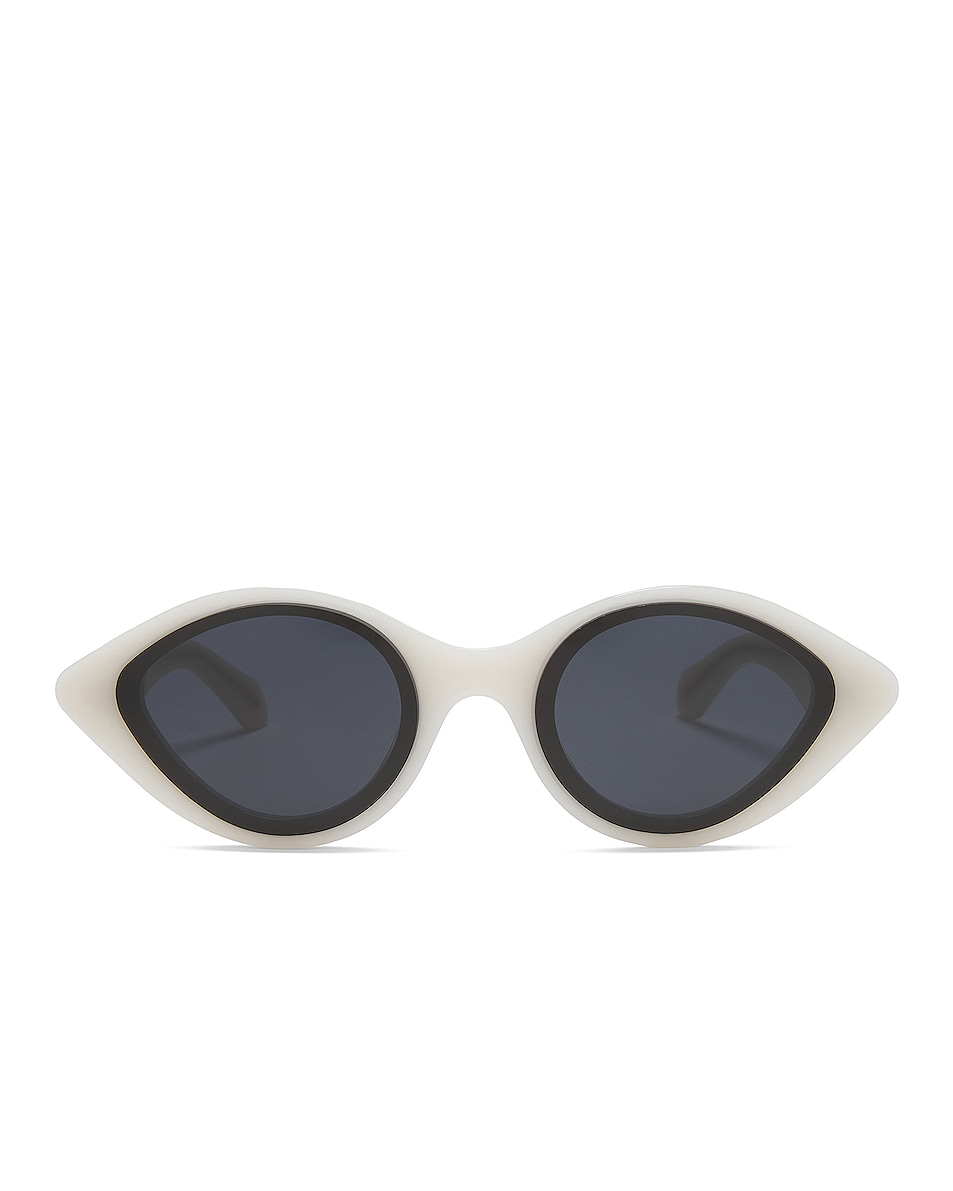 Image 1 of ALAÏA Lettering Logo Oval Sunglasses in White & Grey