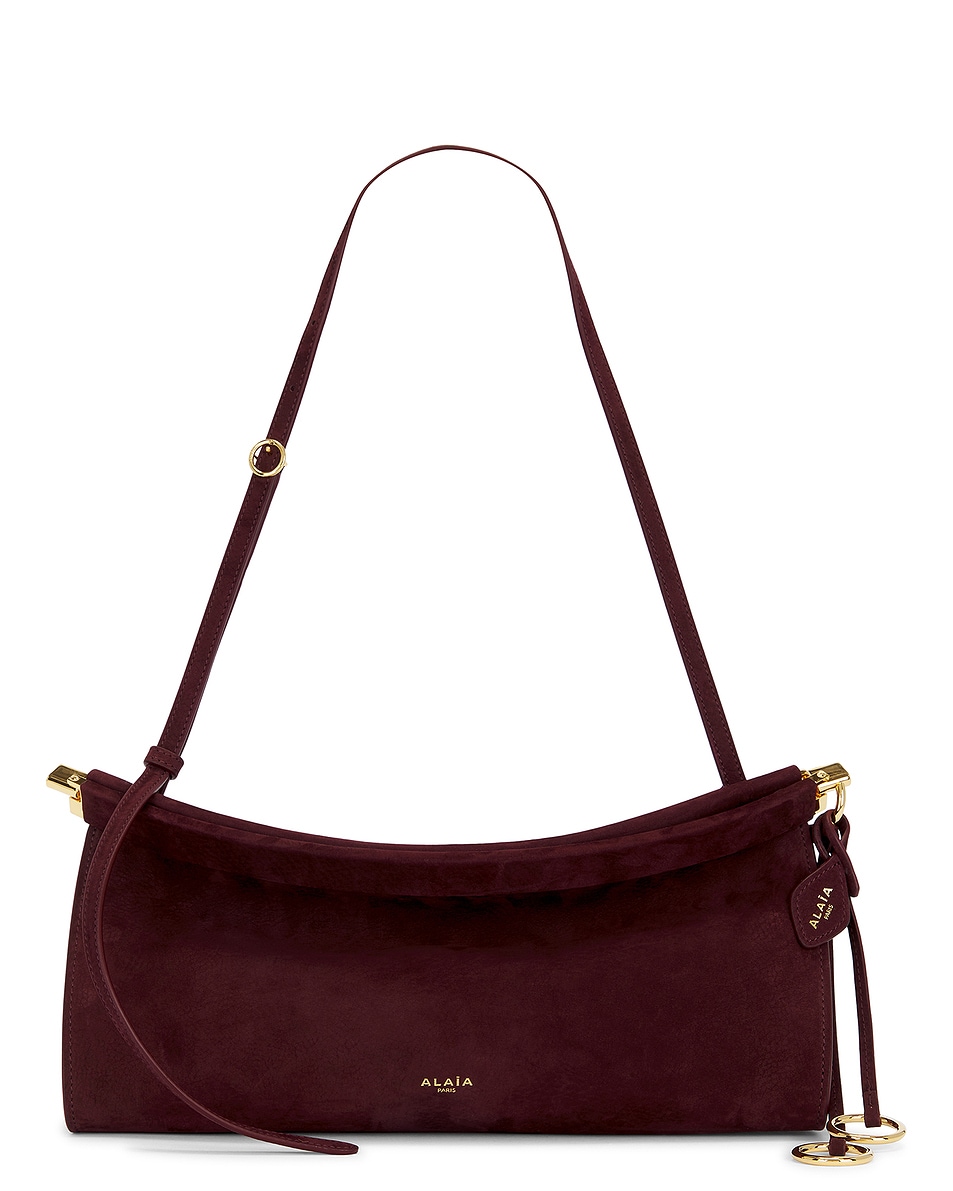 Image 1 of ALAÏA Medium East West Bag in Rouge Grenat