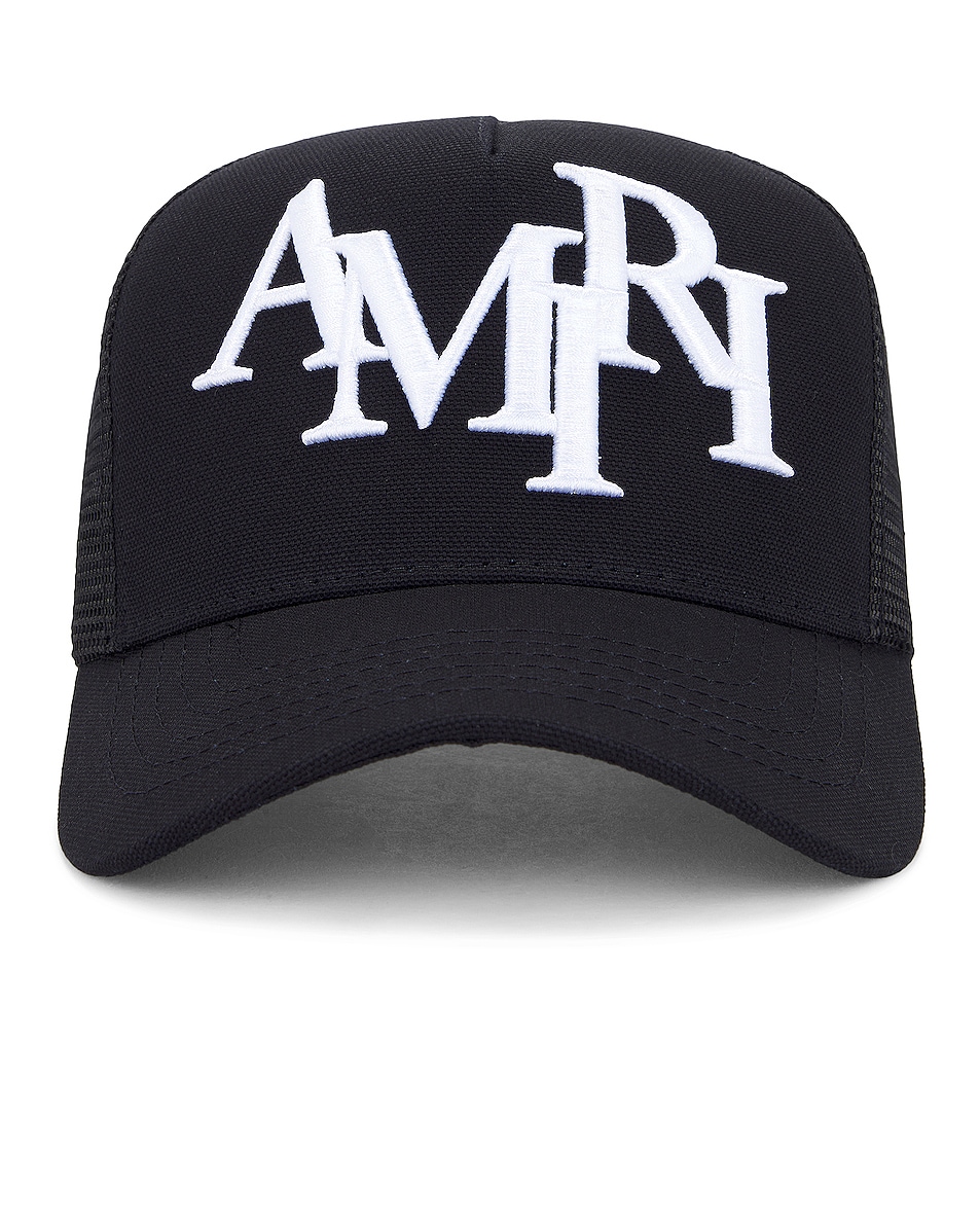 Image 1 of Amiri Staggered Logo Trucker Hat in Black