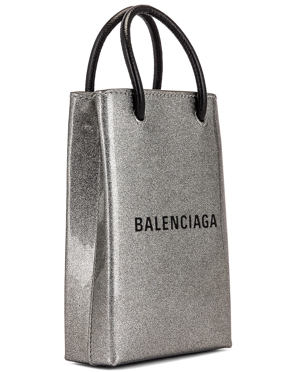Balenciaga Glitter Shopping Phone on Strap Bag in Silver | FWRD