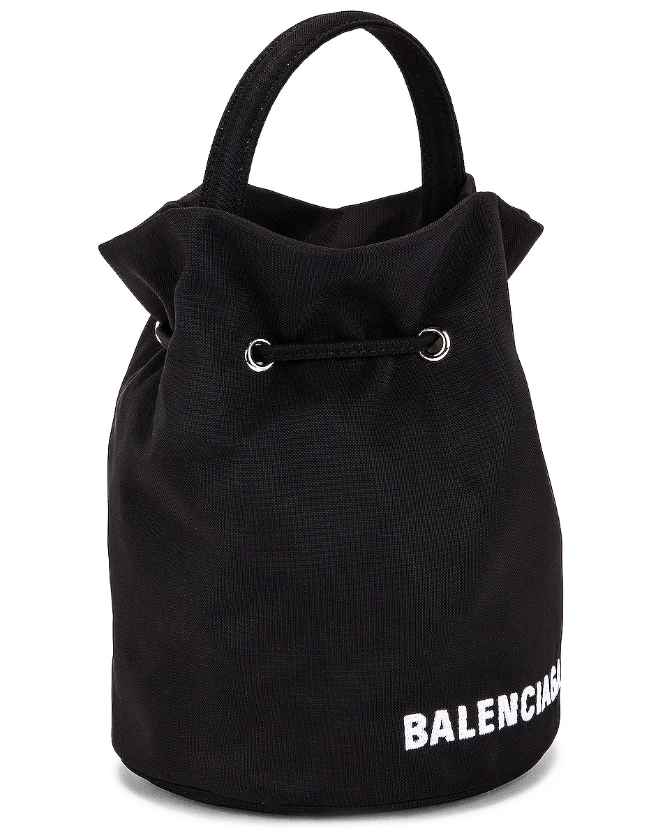Balenciaga XS Wheel Drawstring Bag in Black & White FWRD