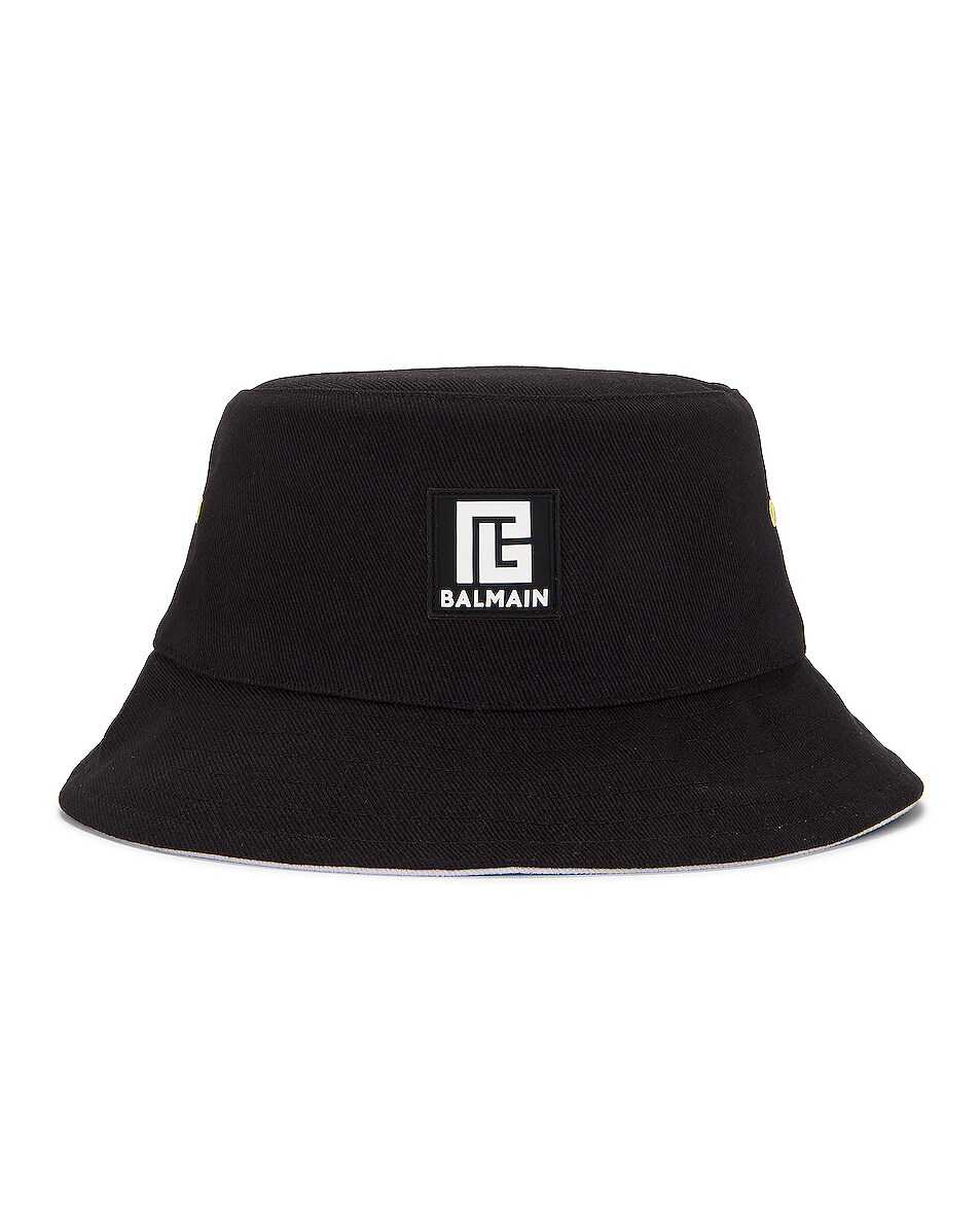Image 1 of BALMAIN Reversible Patch Bucket Hat in Noir & Blanc