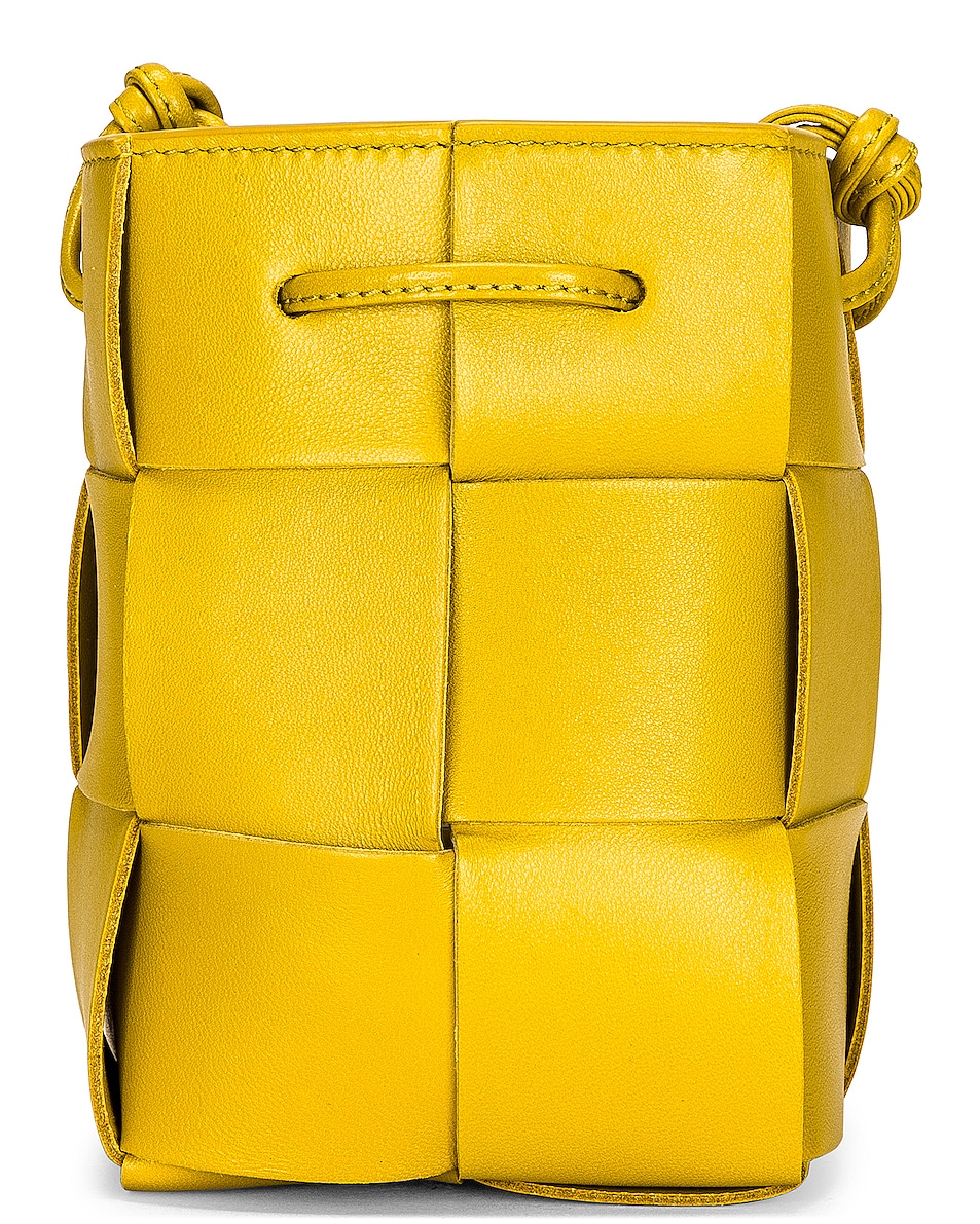 Bottega Mini Cassette Bucket Bag in Pollen & Gold FWRD
