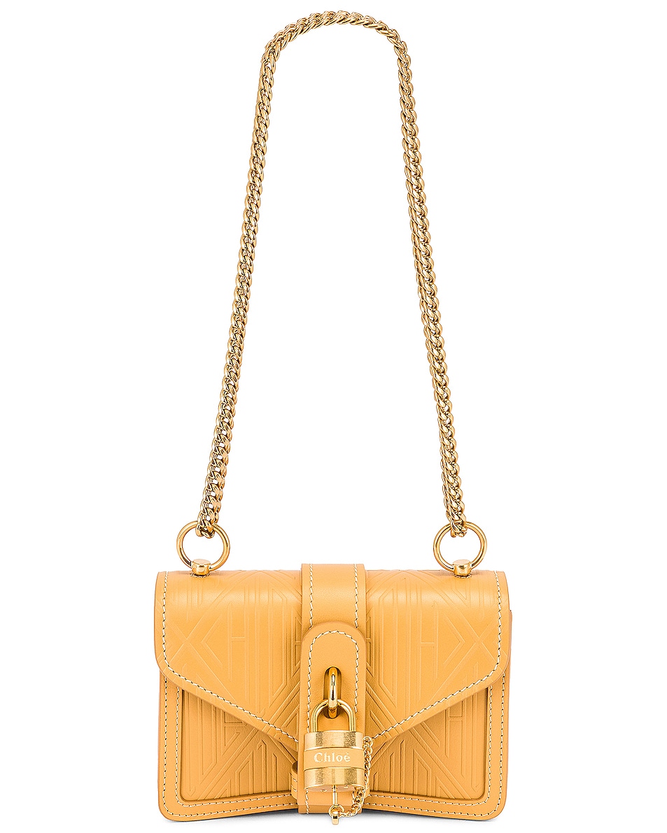 Chloe Mini Aby Chain Embossed Monogram Shoulder Bag in Honey Gold | FWRD