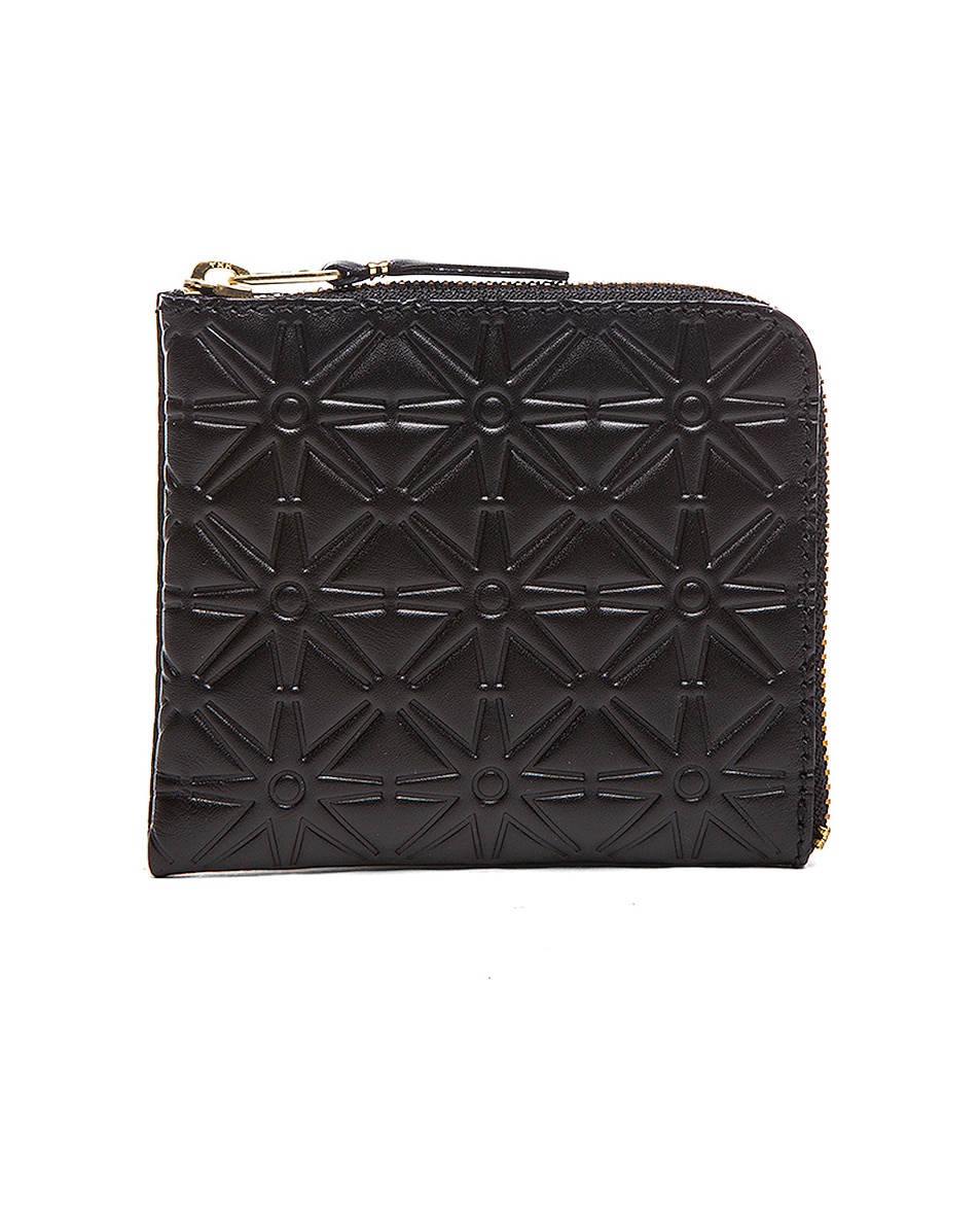 Image 1 of COMME des GARCONS Small Star Embossed Zip Wallet in Black