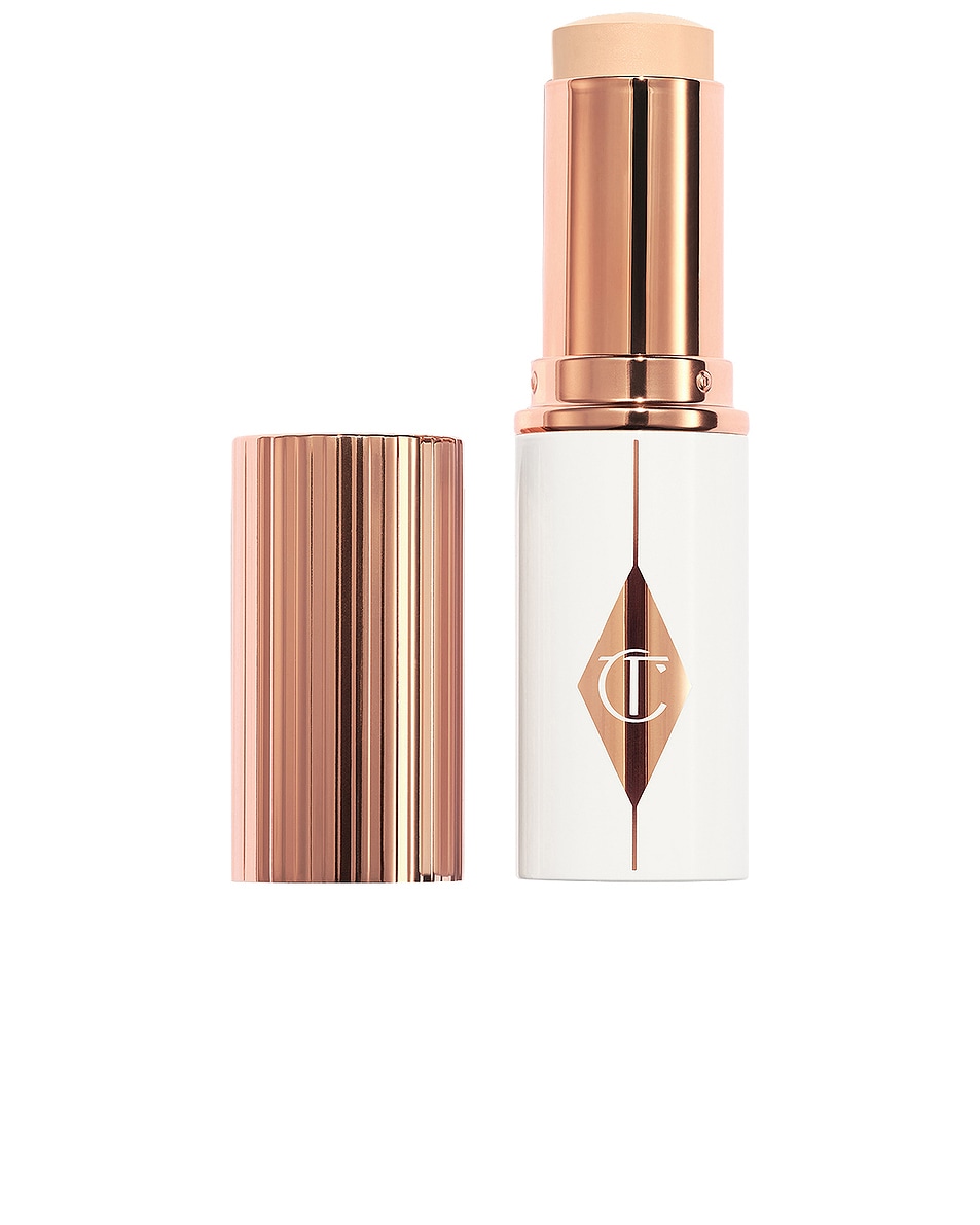 Image 1 of Charlotte Tilbury Unreal Skin Sheer Glow Tint Hydrating Foundation Stick in 1.5 Fair