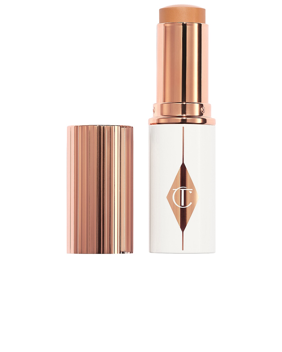 Image 1 of Charlotte Tilbury Unreal Skin Sheer Glow Tint Hydrating Foundation Stick in 8 Medium