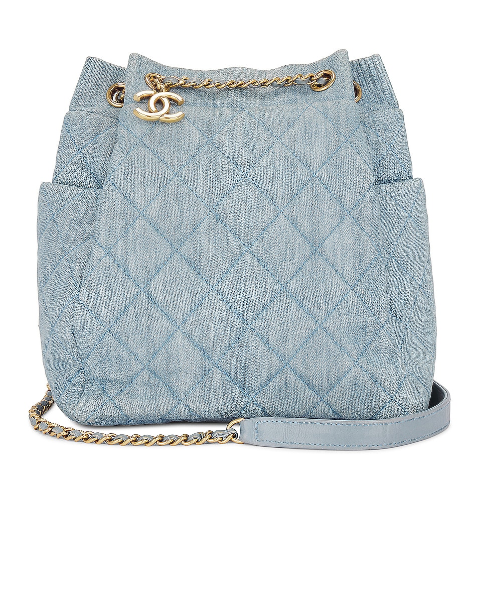 FWRD Renew Chanel Denim Drawstring Chain Bucket Bag in Blue FWRD