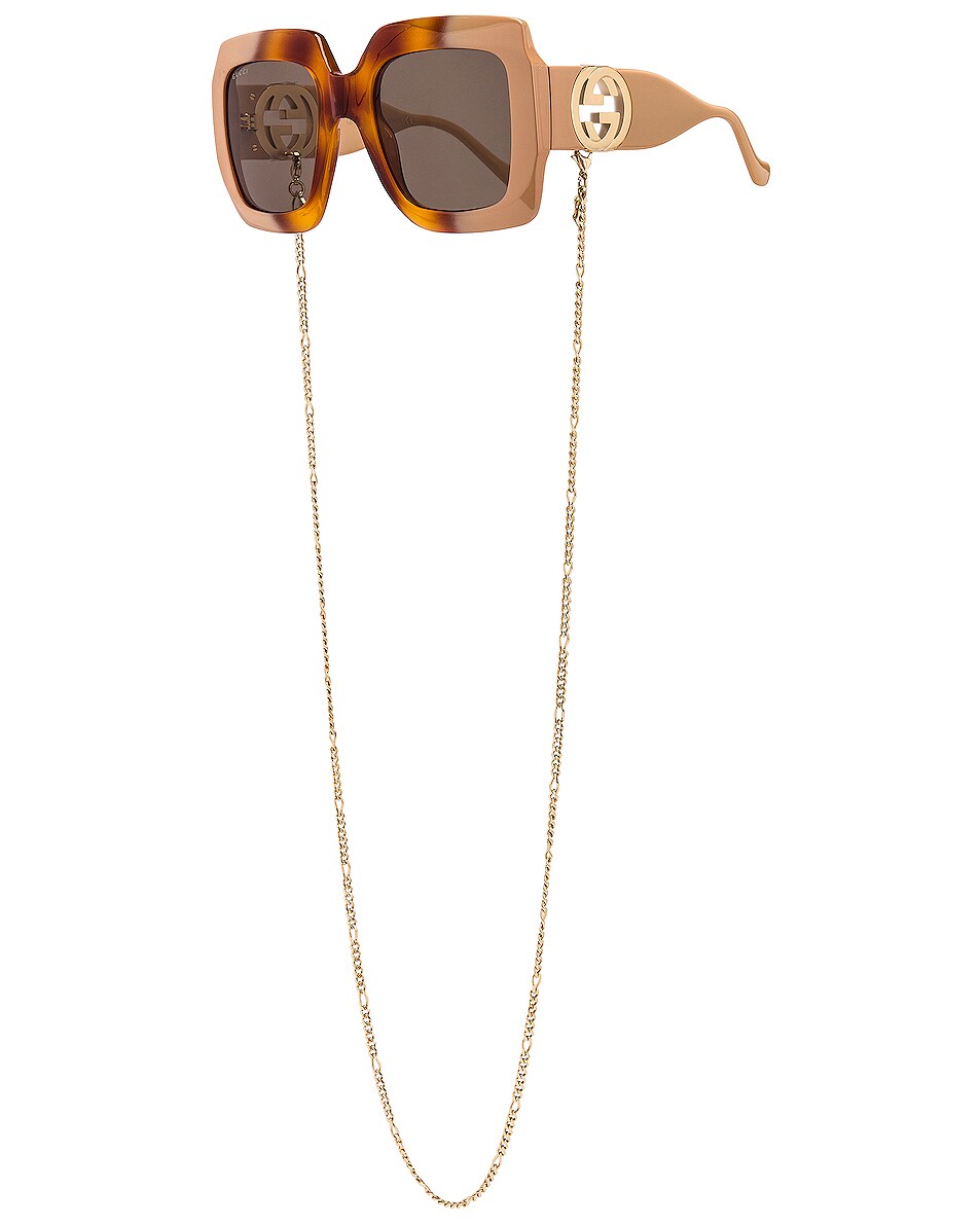 Image 1 of Gucci Chain GG Cut Out Sunglasses in Shiny Gradient Havana