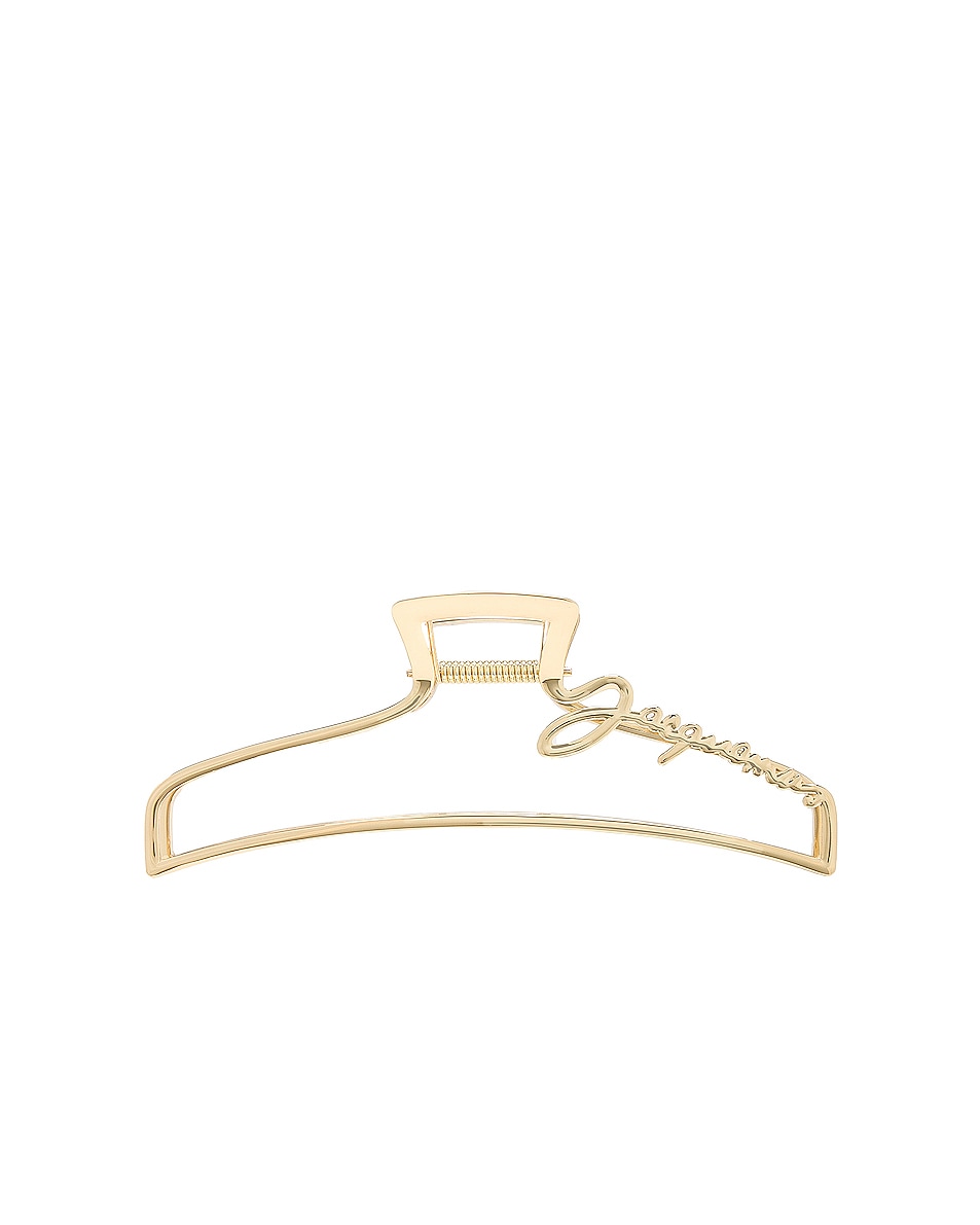 Image 1 of JACQUEMUS La Grande Pince Jacquemus in Yellow Gold