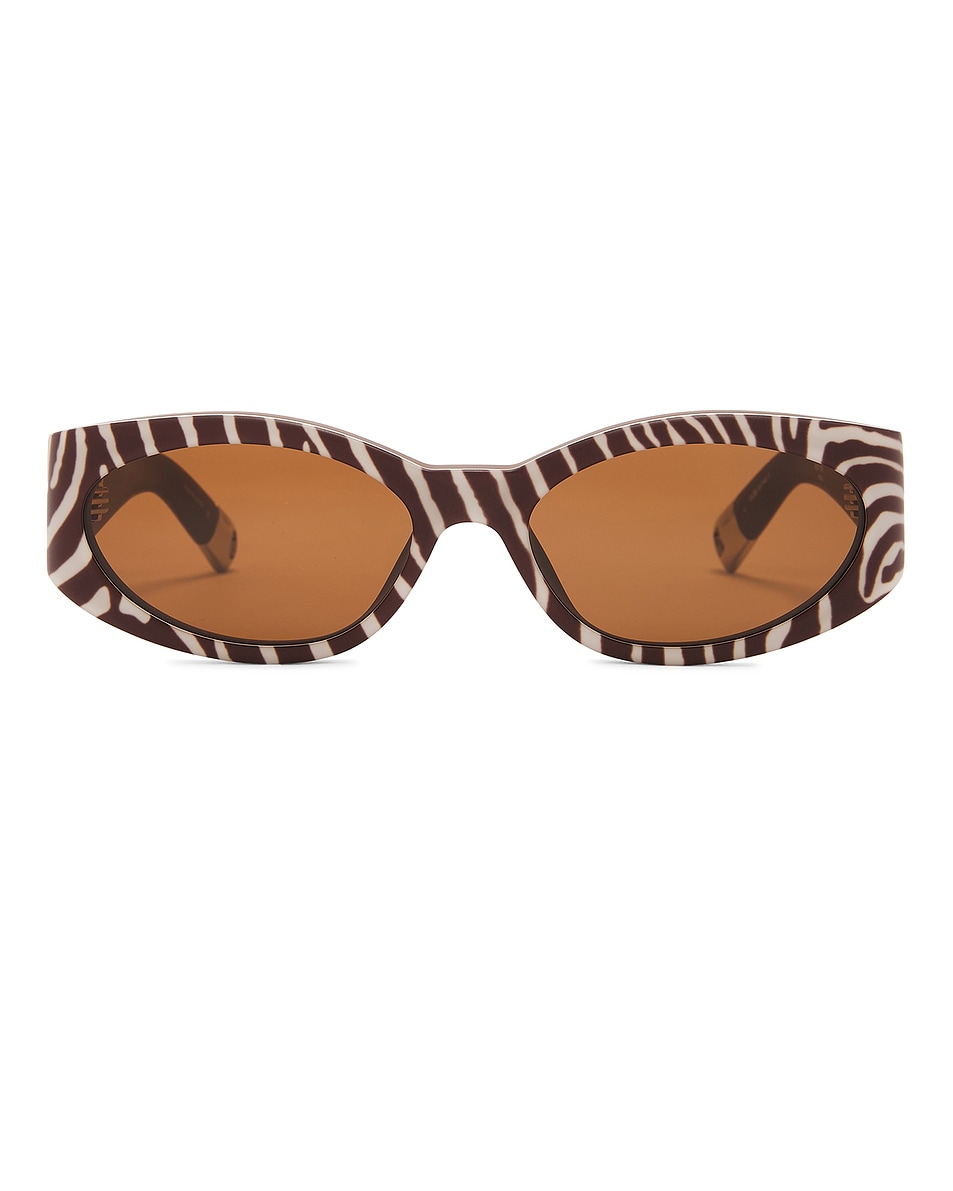 Image 1 of JACQUEMUS Ovalo Sunglasses in Matte Brown, Zebra, & Matte Black