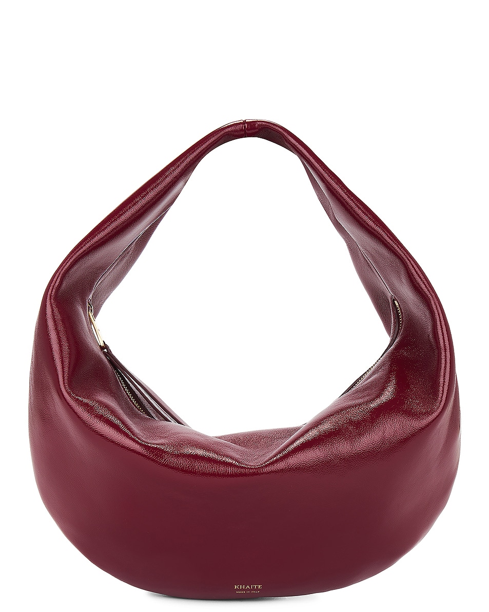 Image 1 of KHAITE Olivia Patent Hobo Bag in Oxblood