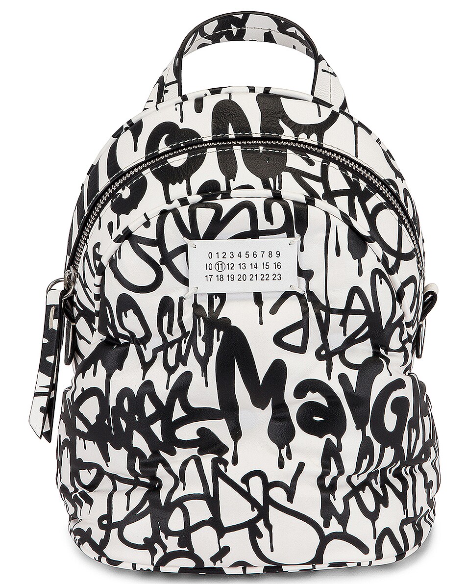 Image 1 of Maison Margiela Glam Slam Graffiti Crossbody Backpack in White & Black