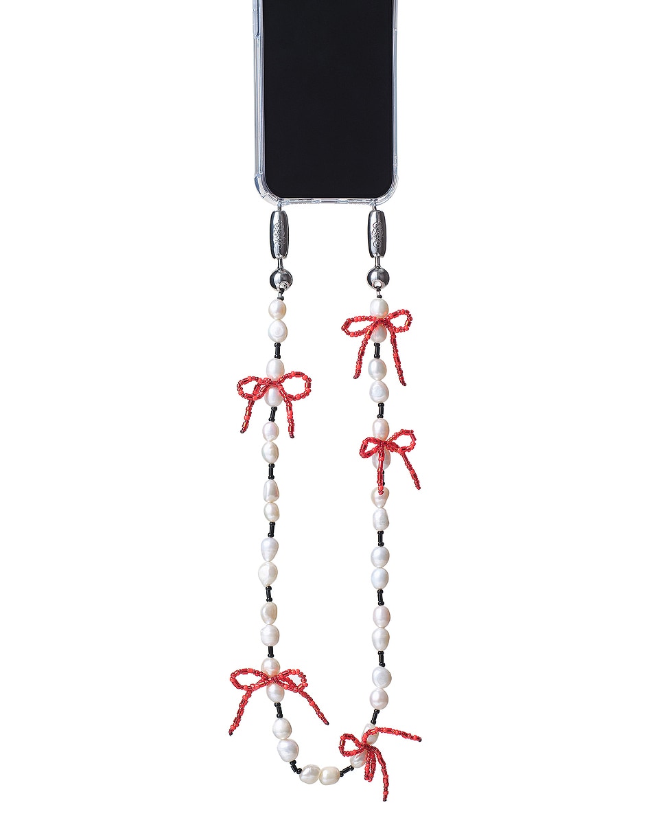 Image 1 of Ossa Pearl And Bow Shoulder Length Phone Chain in Ivory & Red