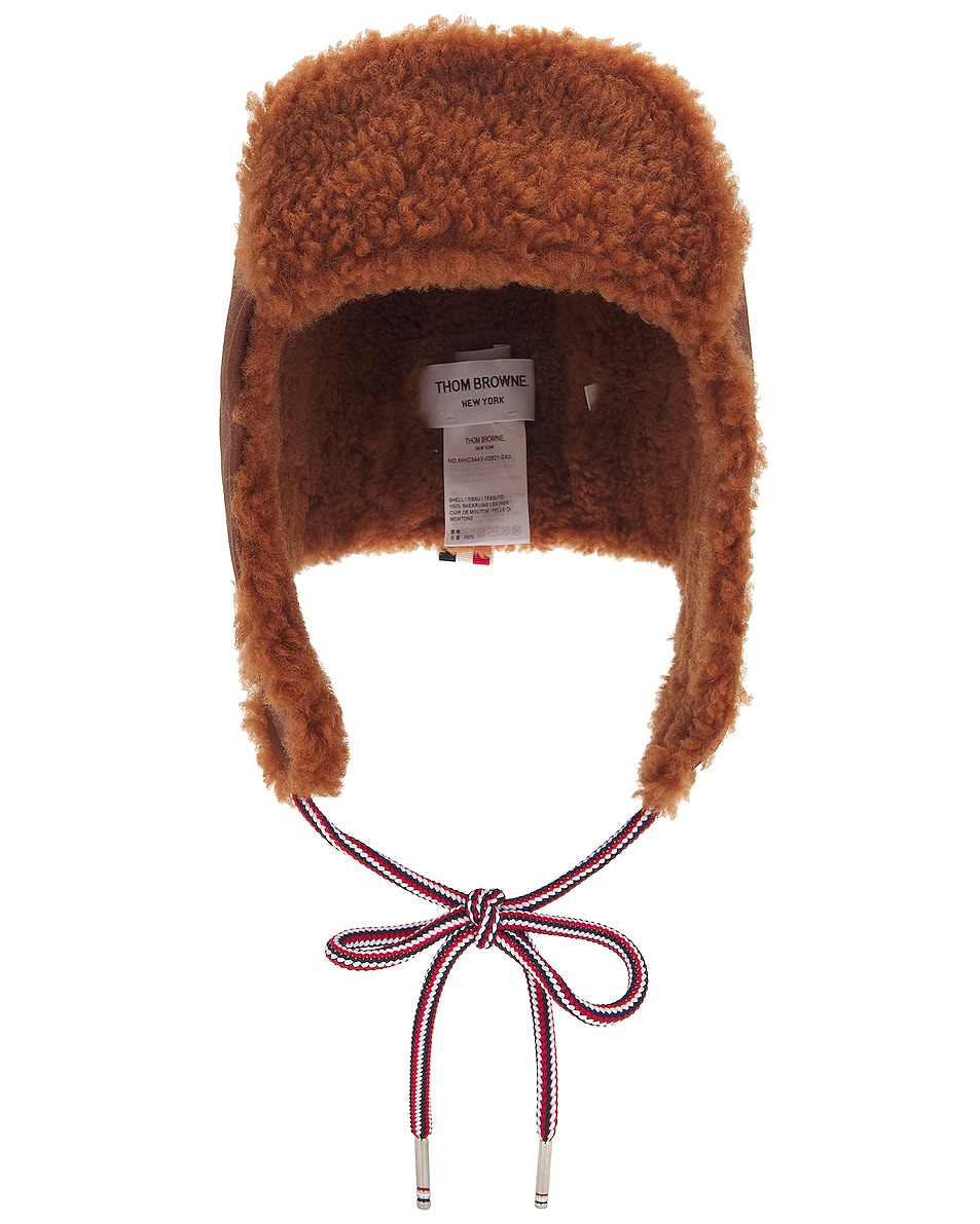 Image 1 of Thom Browne Dyed Shearling Tie Hat in Ginger
