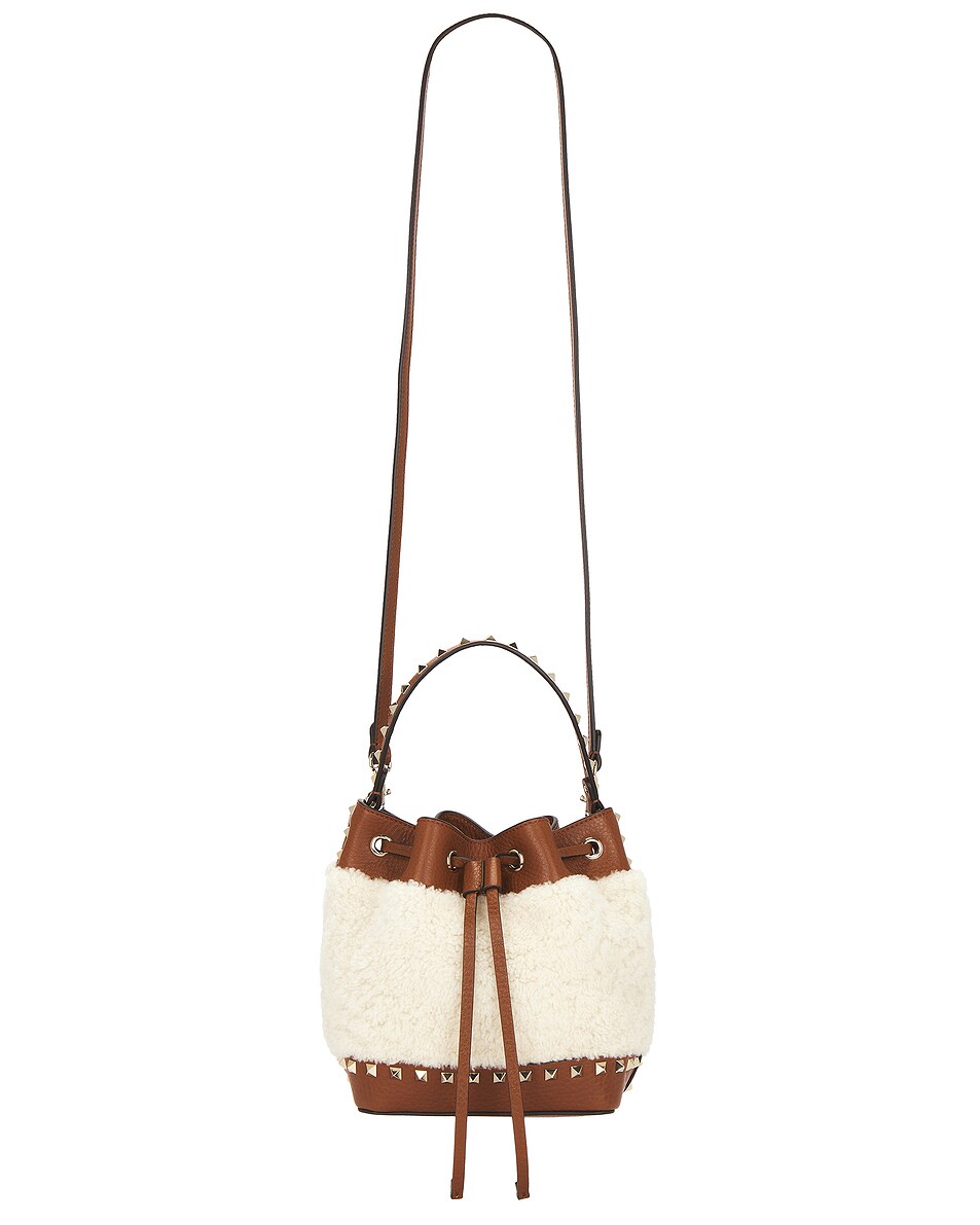 Image 1 of Valentino Garavani Rockstud Drawstring Bag in Naturale & Selleria