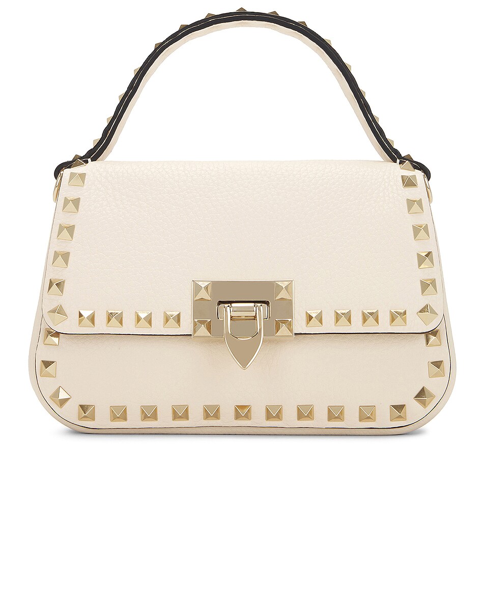 Valentino Garavani Small Rockstud Top Handle Bag in Light Ivory | FWRD