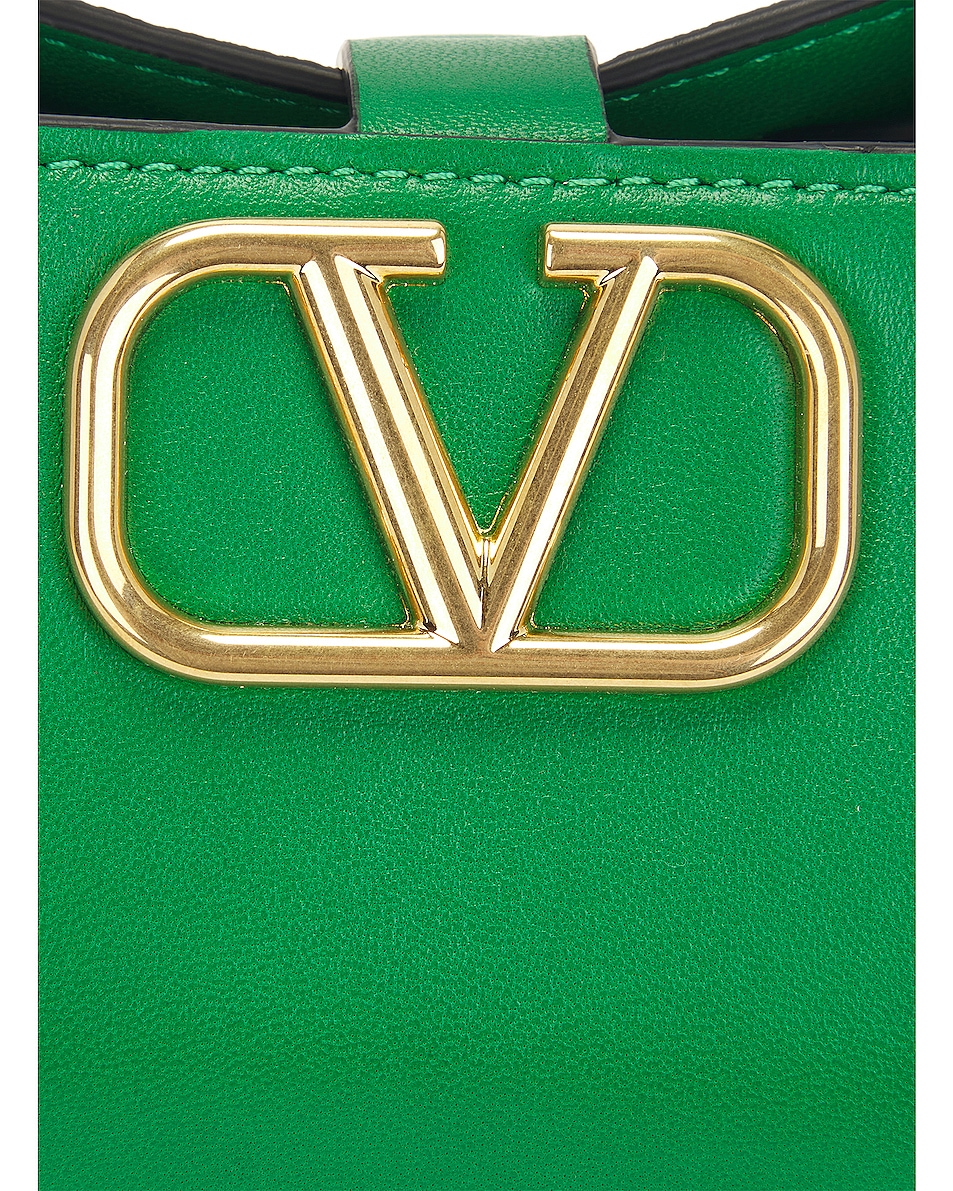 Valentino Garavani Mini V Logo Signature Bucket Bag in Gea Green | FWRD