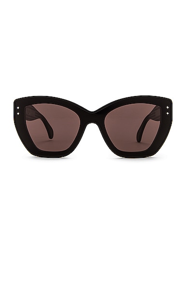 Alaïa Feminine Soft Cat Eye Sunglasses In Shiny Black