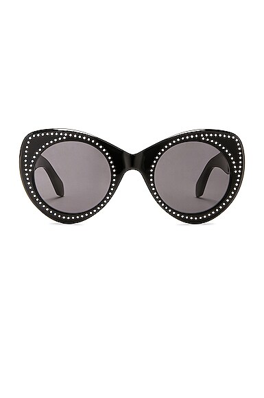 ALAÏA Round Acetate Sunglasses in Shiny Solid Black