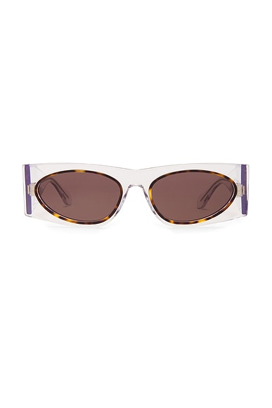 ALAÏA Oval Transparent Sunglasses in Crystal & Grey