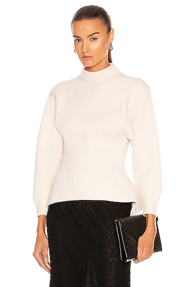 ALAÏA Fitted Sculpted Long Sleeve Sweater in Ivoire