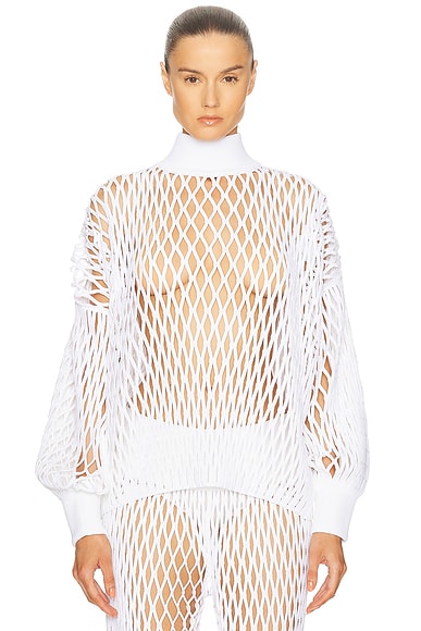 ALAÏA Long Sleeve Turtleneck Top in Blanc
