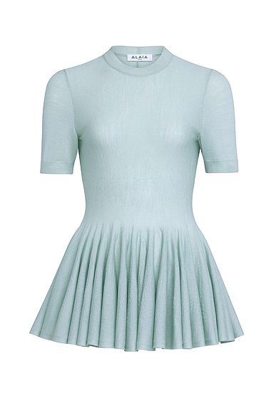 ALAÏA Peplum Top in Vert Amande