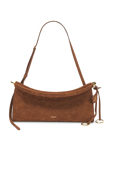 ALAÏA Medium East West Bag in Terre D'ombre