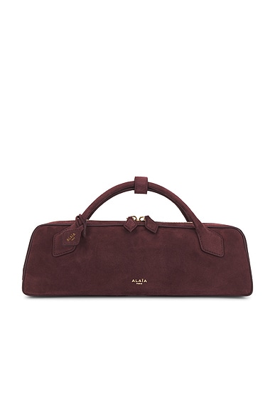 ALAÏA Teckel Clutch in Rouge Grenat