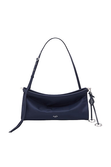 ALAΪA Medium East West Bag in Minuit