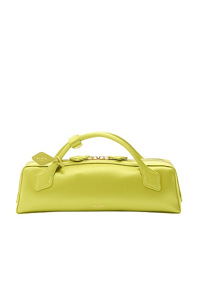 ALAΪA Teckel Clutch Bag in Lime