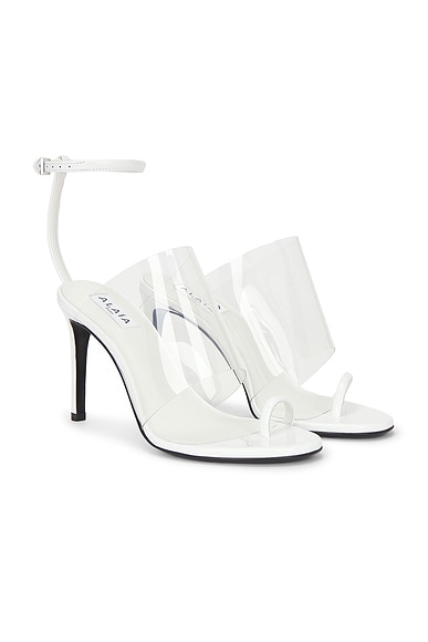 ALAÏA Asymmetric Sandal in Blanc Optique