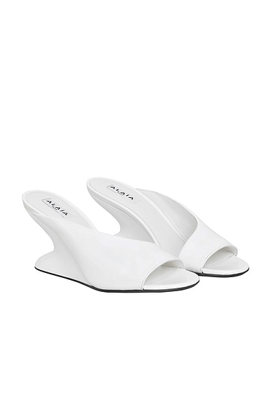 ALAÏA Wedge Mule in Blanc Optique