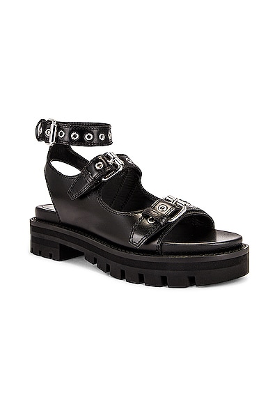 ALAÏA BUCKLE SANDALS