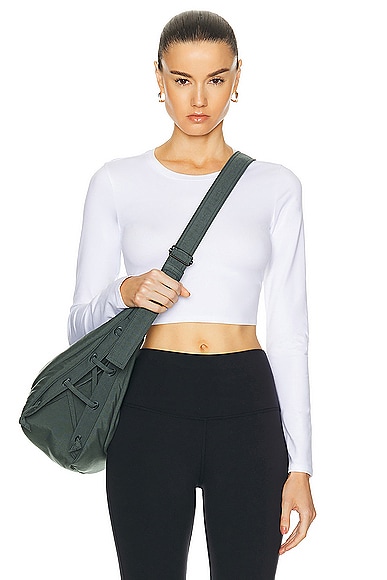 Shop Alo Yoga Alosoft Crop Finesse Long Sleeve Top In White