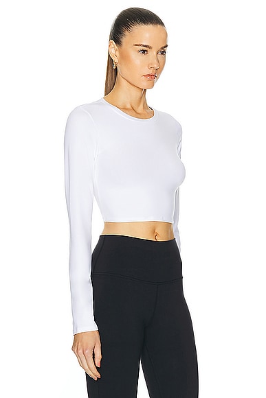 Shop Alo Yoga Alosoft Crop Finesse Long Sleeve Top In White
