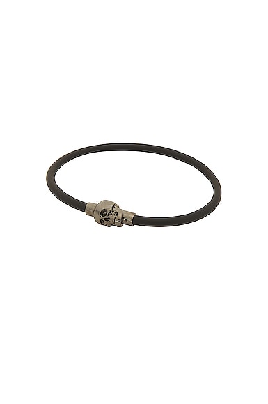 Shop Alexander Mcqueen Rubber Cord Skull Bracelet In Black