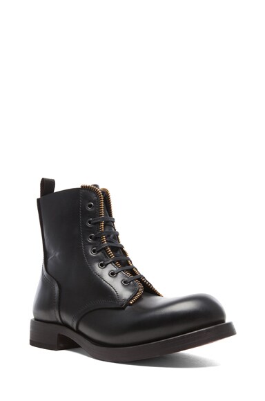 McQueen Combat Leather Boots with Zipper in Black & Gold | FWRD