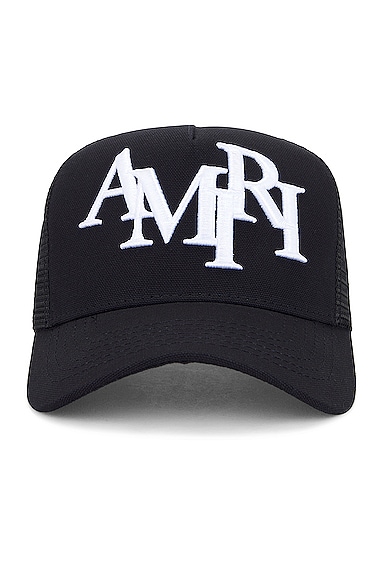 Amiri Staggered Logo Trucker Hat in Black