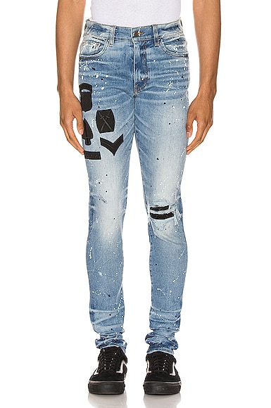 パンツ AMIRI Indigo Paint Military Patch Jeans Amiri Painted Military Patch Jean in Medium Crafted Indigo | FWRD