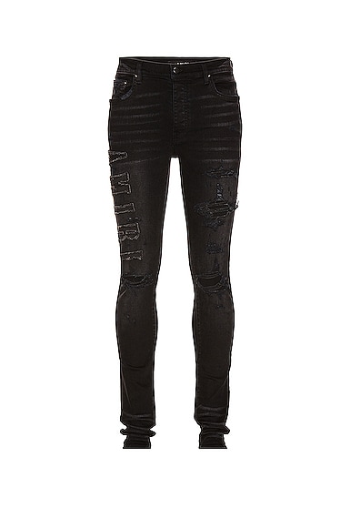 Amiri Logo Applique Jean In Black | ModeSens