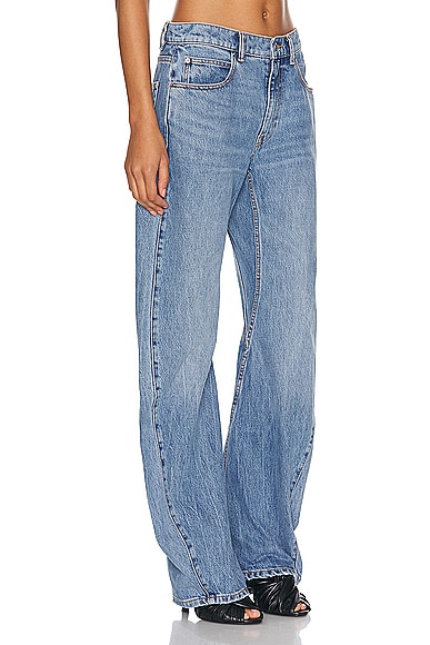 Shop Alexander Wang Slouchy Twisted Mid Rise In Vintage Light Indigo