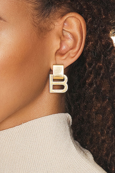 Shop Balenciaga Hourglass Earrings In Gold