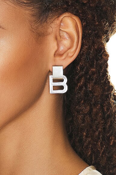 Shop Balenciaga Hourglass Earrings In Silver