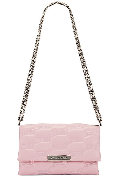 Click to view more detailed imagery on our partner's website Balenciaga Small Triplet Bag In Candy Pink